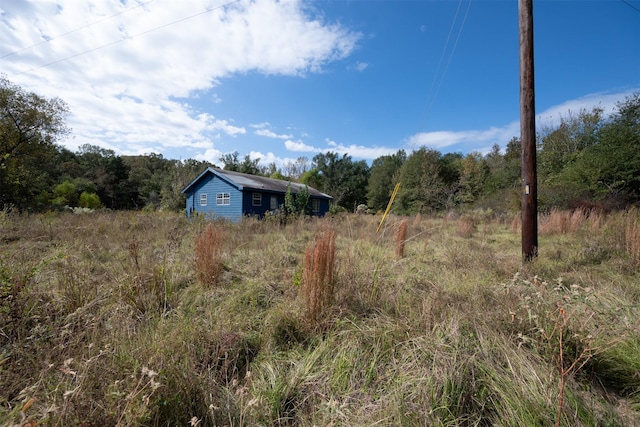 396 Fcr Unit 261, Oakwood, TX 75855 - view of yard featuring a wooded view