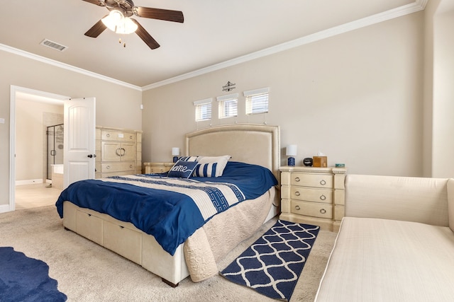 carpeted bedroom featuring ensuite bath, crown molding, and ceiling fan