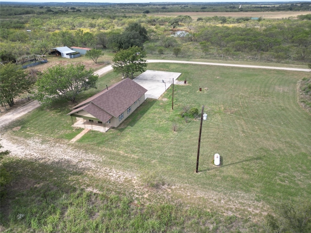 birds eye view of property with a rural view