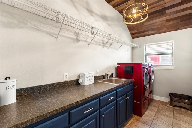 washroom featuring washer and dryer, cabinets, wood ceiling, and sink