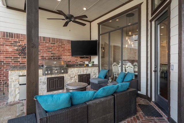 view of patio featuring an outdoor living space, an outdoor kitchen, ceiling fan, and a grill