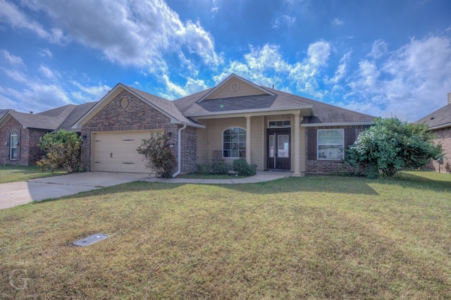 ranch-style house with a garage and a front lawn