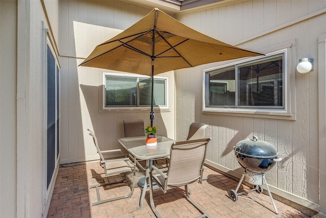 view of patio with a grill