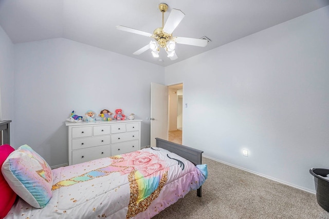 carpeted bedroom with ceiling fan and lofted ceiling