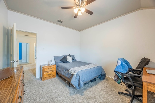 bedroom featuring ornamental molding, carpet, lofted ceiling, and ceiling fan