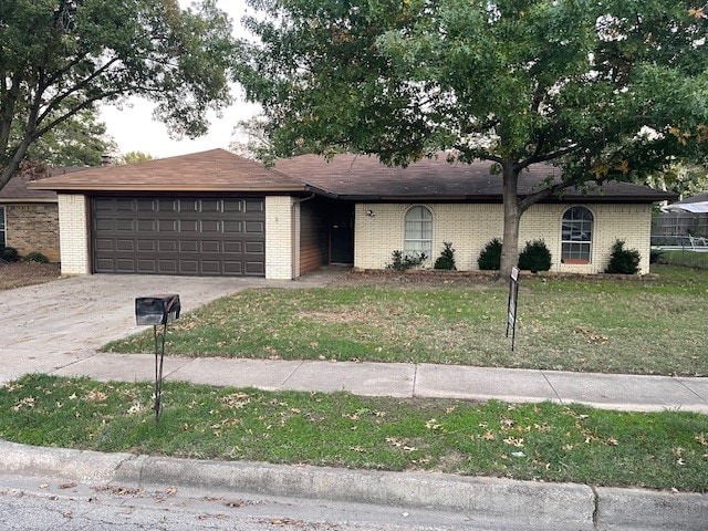 ranch-style house featuring a garage