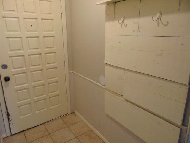 doorway featuring light tile patterned floors