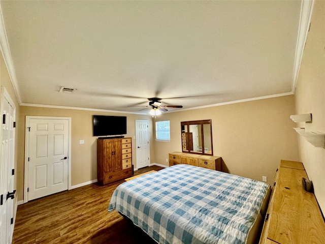 bedroom with crown molding, ceiling fan, and wood-type flooring