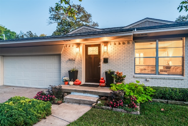 ranch-style home with a garage