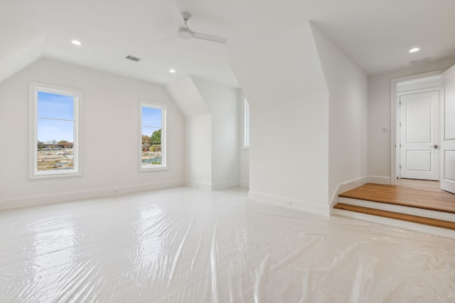 bonus room with vaulted ceiling and ceiling fan