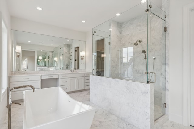 bathroom featuring plus walk in shower and vanity