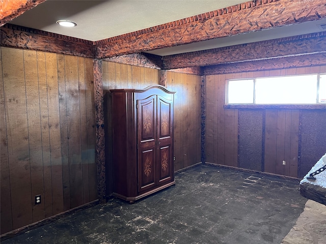 interior space featuring wood walls