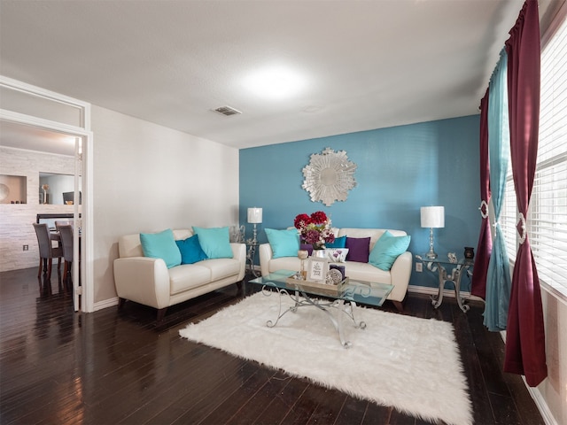 living room featuring dark hardwood / wood-style floors