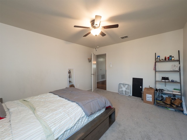 carpeted bedroom with ceiling fan