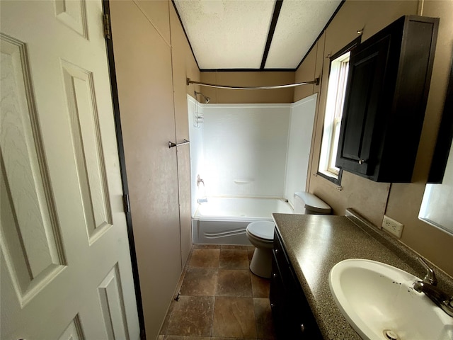 full bathroom with toilet, a textured ceiling, vanity, and shower / bath combination