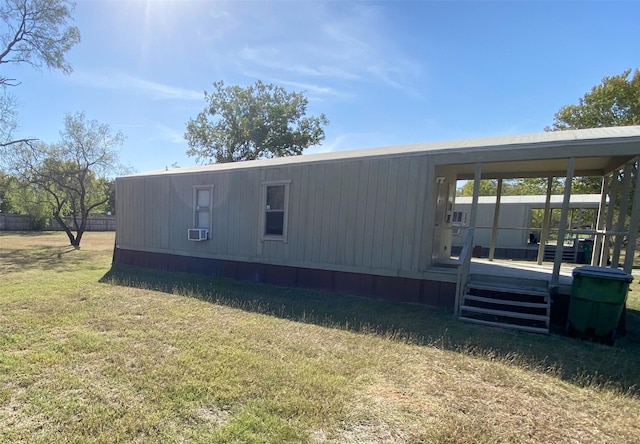 605 E Jacksboro St, Chico, TX 76431 - view of side of property with a wooden deck and a yard