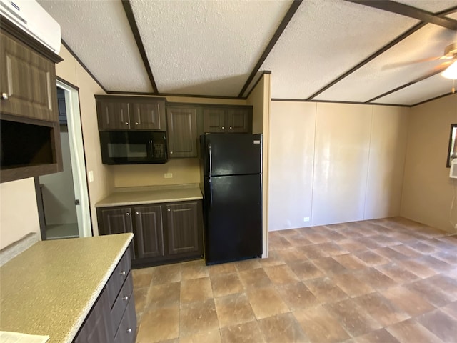 kitchen featuring black appliances, vaulted ceiling with beams, a textured ceiling, ceiling fan, and dark brown cabinetry