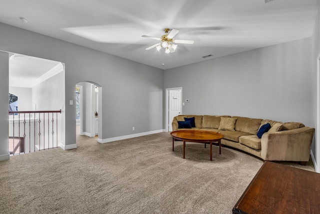 4604 Wisdom Creek Ct, Flower Mound, TX 75022 - carpeted living room featuring arched walkways, ceiling fan, baseboards, and visible vents