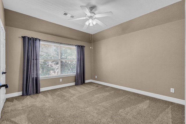 unfurnished room with light carpet and ceiling fan