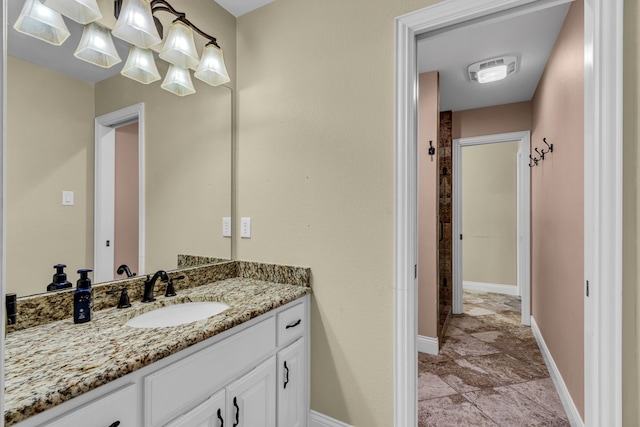 bathroom with vanity and tile patterned flooring