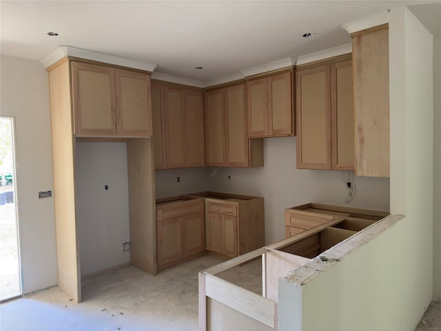 kitchen with light brown cabinetry