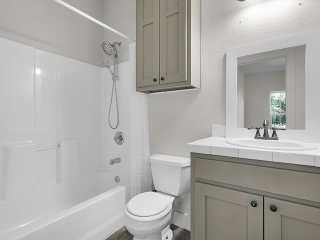 full bathroom featuring vanity, toilet, and shower / tub combo