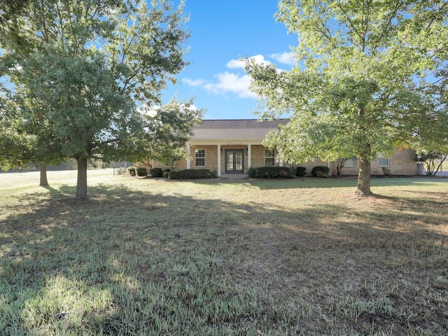 view of front of property with a front lawn