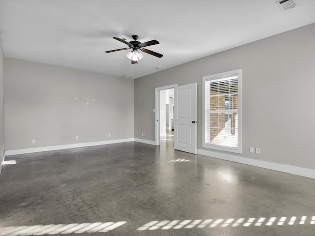 spare room with ceiling fan