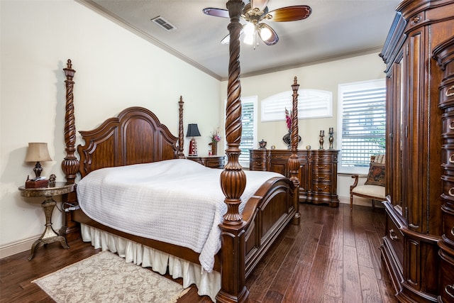 bedroom featuring ornamental molding, dark hardwood / wood-style floors, and ceiling fan