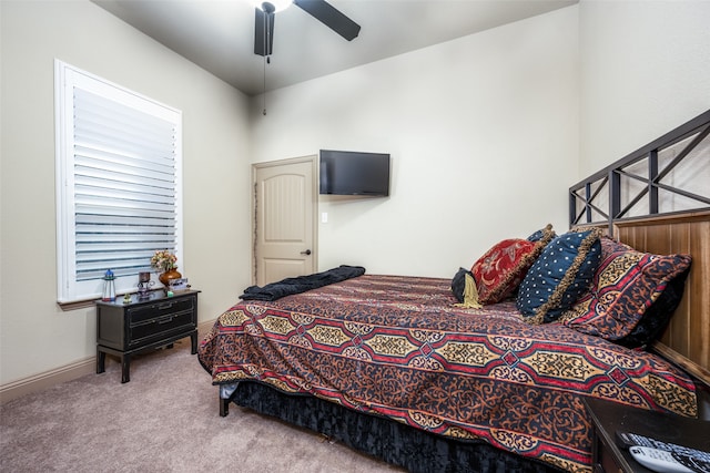 bedroom featuring ceiling fan and carpet flooring