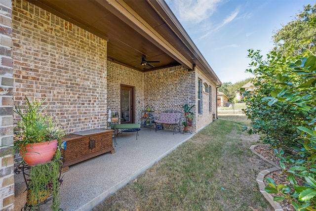 view of patio featuring ceiling fan