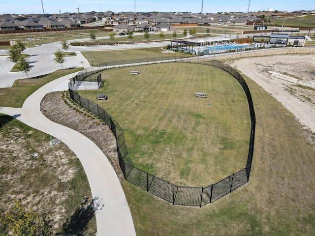 birds eye view of property with a residential view