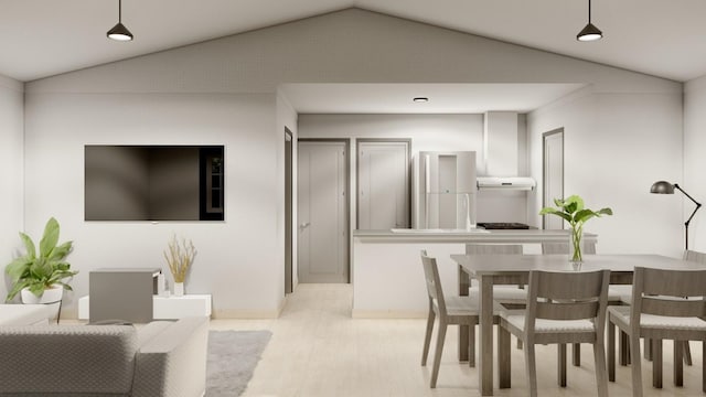 dining area featuring light hardwood / wood-style flooring and lofted ceiling