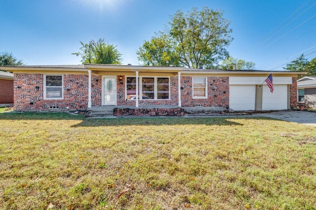 single story home with a garage and a front yard