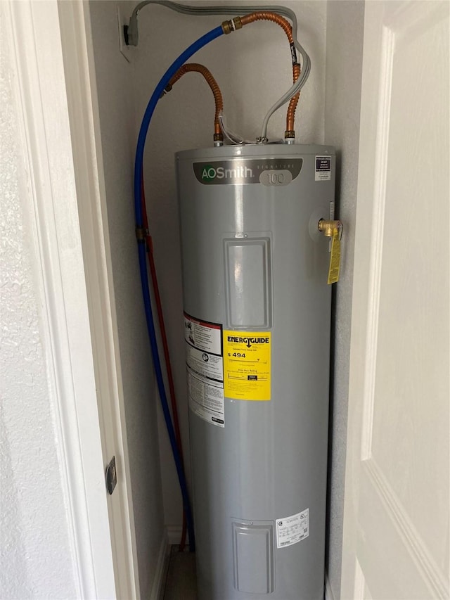 utility room with water heater