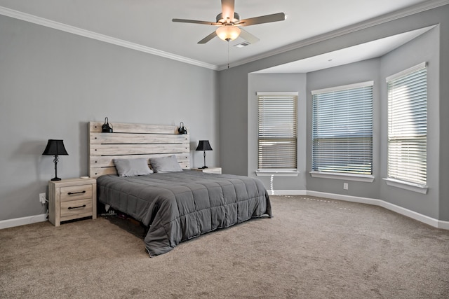 carpeted bedroom featuring crown molding, multiple windows, and ceiling fan