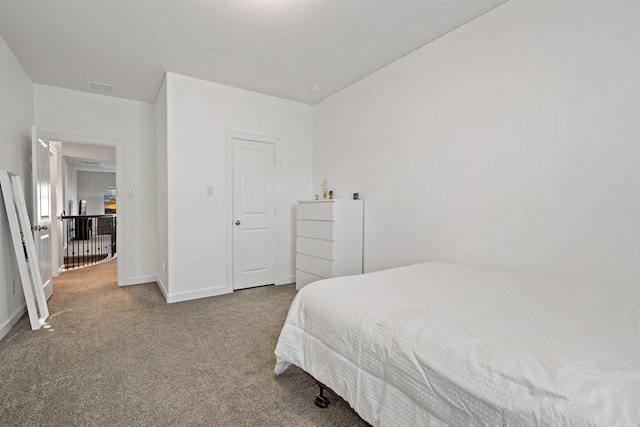 bedroom featuring carpet flooring