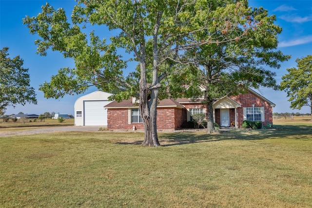 ranch-style home with a front yard and a garage