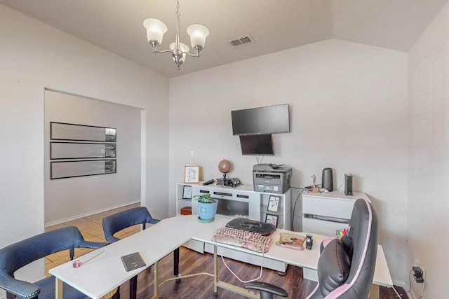 home office featuring tile patterned flooring, a chandelier, and vaulted ceiling