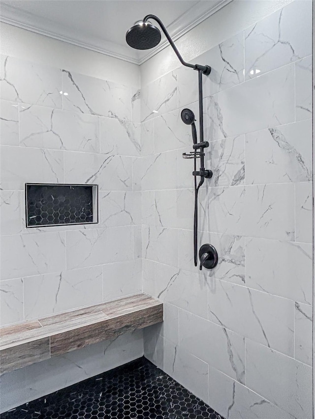 bathroom featuring a tile shower