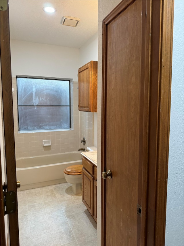 full bathroom with vanity, toilet, and shower / bathtub combination