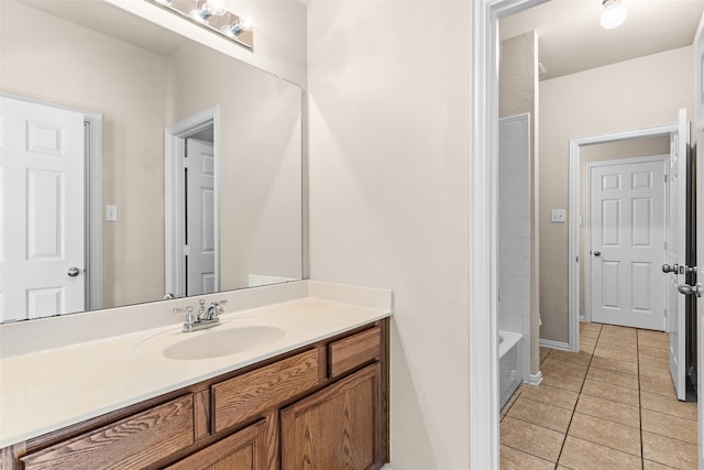 bathroom with shower / bath combination, vanity, and tile patterned flooring