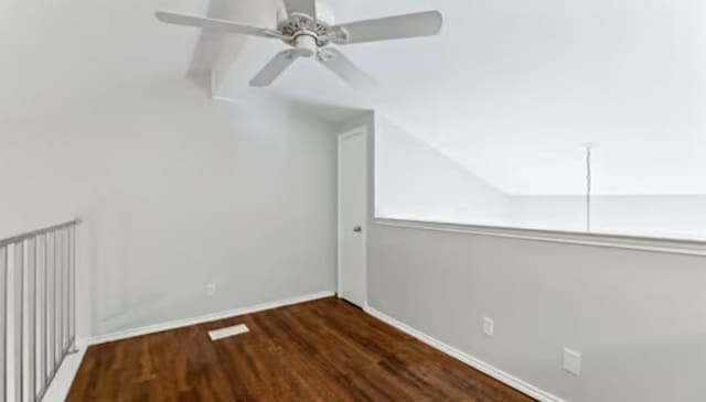 additional living space with dark hardwood / wood-style floors and ceiling fan