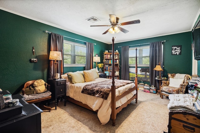 bedroom with crown molding, carpet, and visible vents