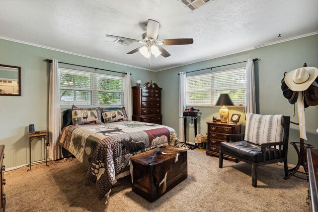 bedroom with ornamental molding, light colored carpet, and visible vents