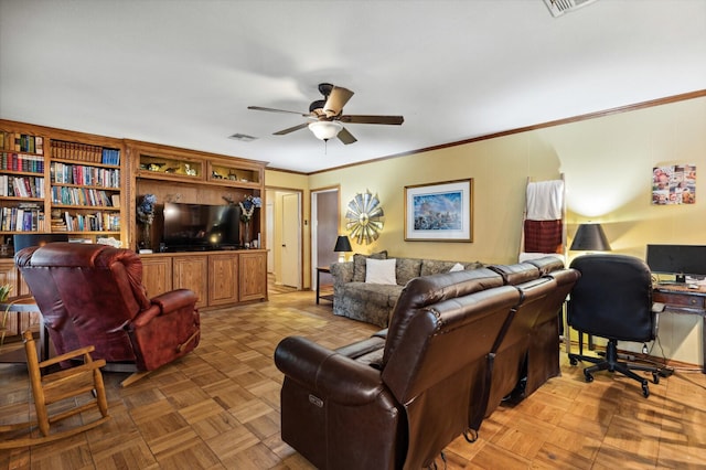 living room featuring ceiling fan, ornamental molding, and visible vents
