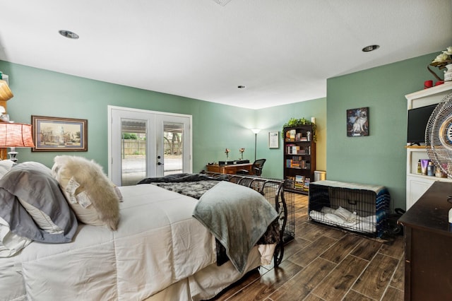 bedroom with french doors, dark wood finished floors, and access to exterior