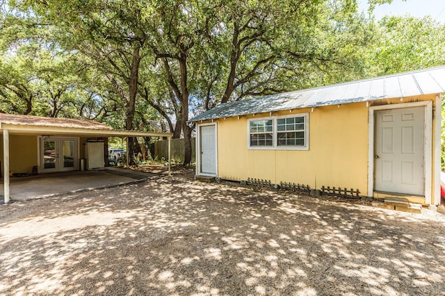 view of outbuilding with an outbuilding and french doors