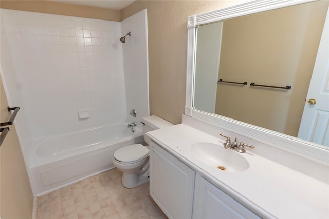 full bathroom with vanity, toilet, and tiled shower / bath