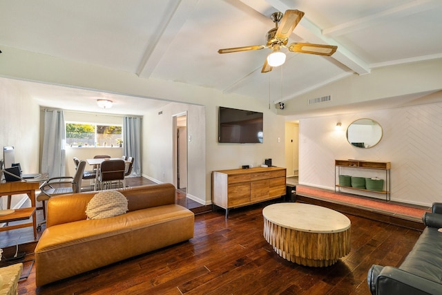 living room featuring vaulted ceiling with beams, ceiling fan, and dark wood-type flooring